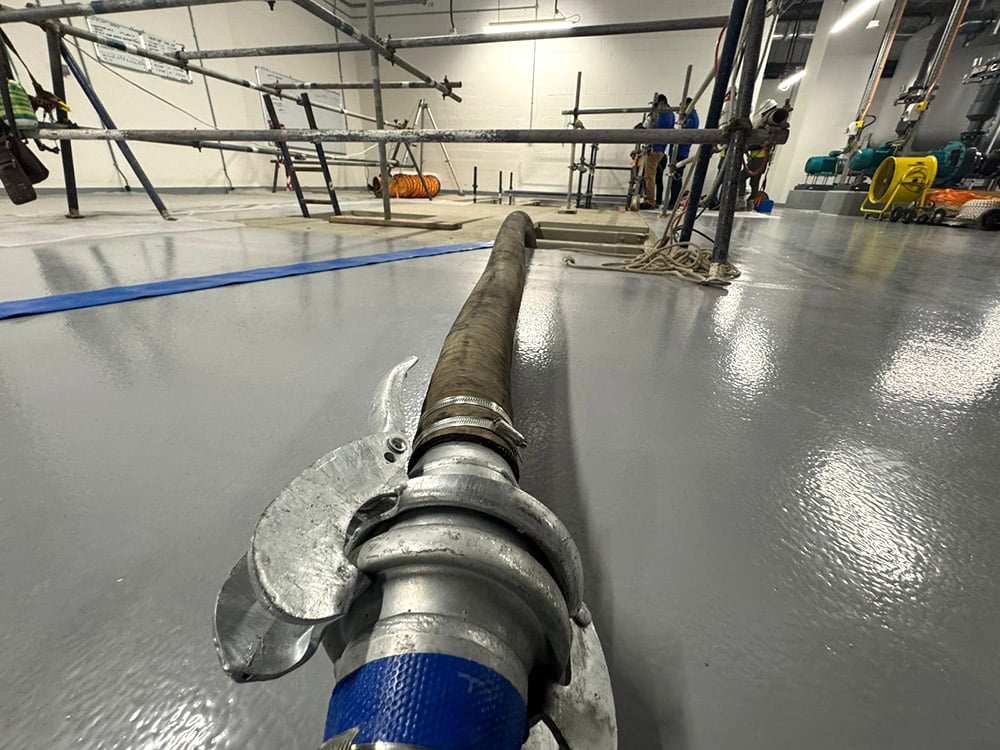 Overpumping Configuration Using Layflat Hose for Saltwater Removal