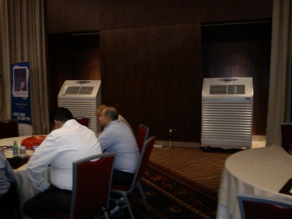 1-conf-cooling_600x4501 Whilst delivering consistent cool circulating air for the large number of conference delegates, the attractive, clean appearance of these AC units from Andrews Sykes Climate Rental does not distract from the intensive conference environment.